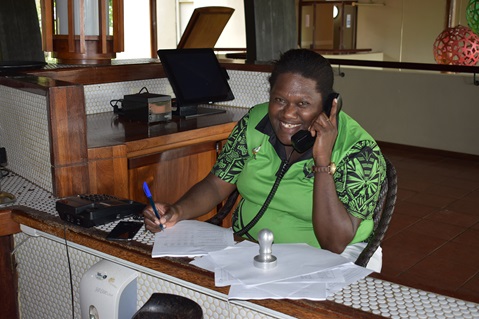 Vanuatu mental health nurse Norah Marie Simon, trained in a WHO-supported programme, helps provide psychosocial support by phone to returnees in post-travel isolation. 